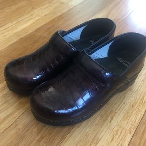 Dansko snakeskin look clogs